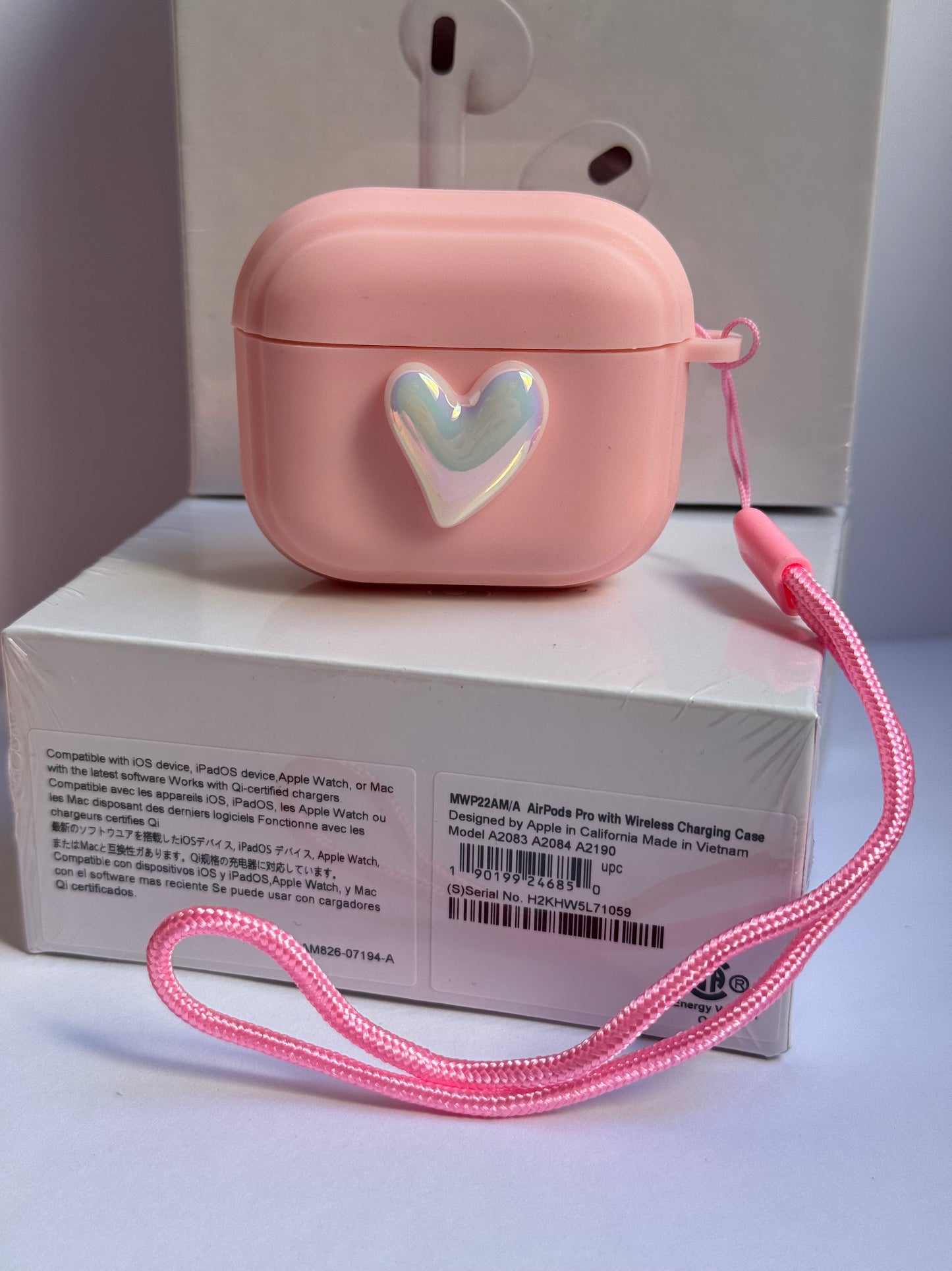Funda AirPods Rosada con corazón y colgante💞